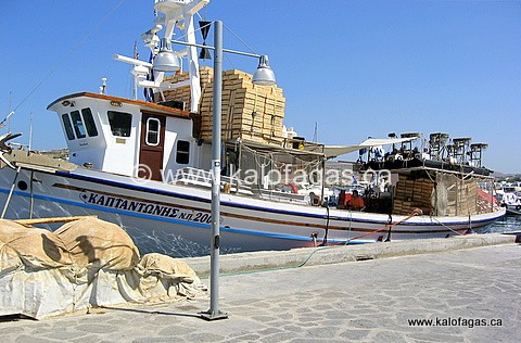 A fishing boat geared and ready for the day of fishing in Paros.