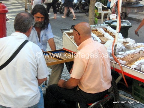 Street vendors playing Backgammon in the Monastiraki district of Athens