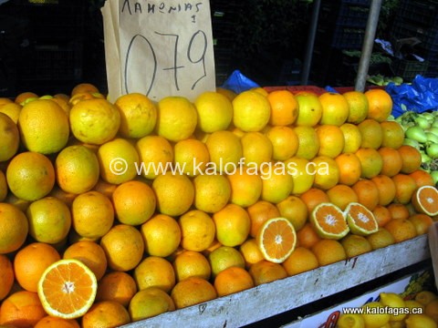 Oranges from Laconia (southern Greece) on sale on fruit stands at a Thessaloniki farmer's market (northern Greece)